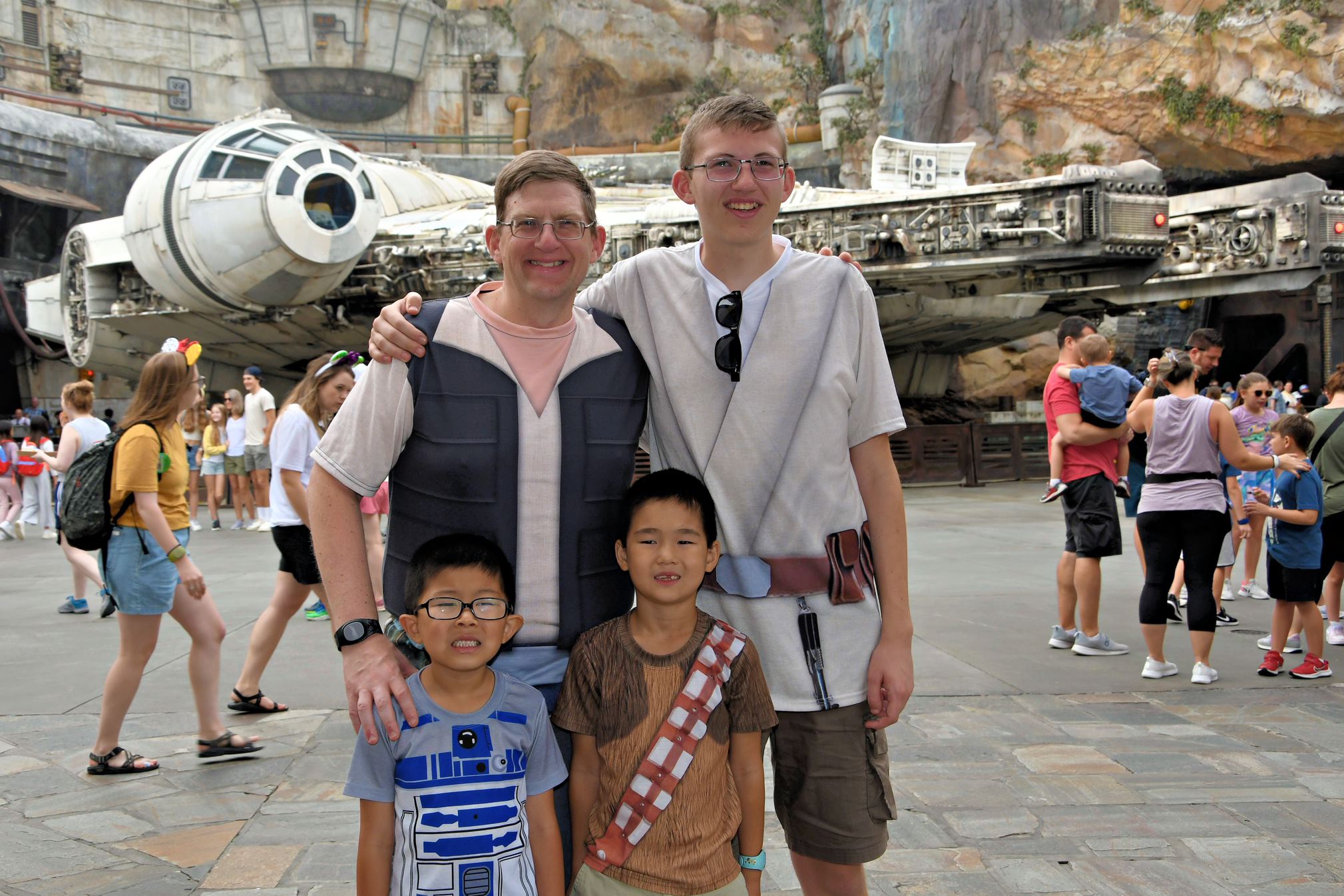 Hollywood studios in front of millenium falcon in star wars land