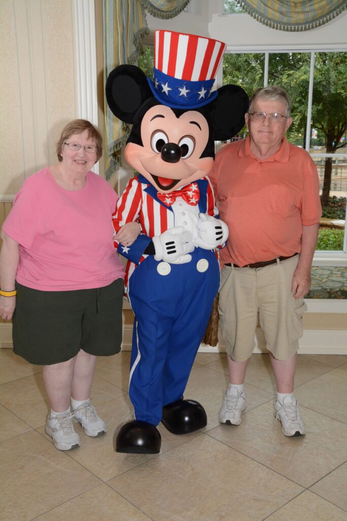 patriotic mickey with grandparents at disney world hotel