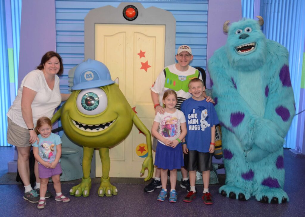 mike and sulley with door from monsters ink at character meet and greet in hollywood studios