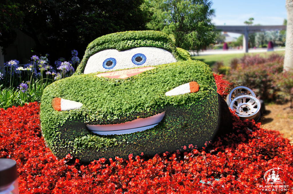 lightening mcqueen topiary at Epcot flower and garden festival in the spring at disney world