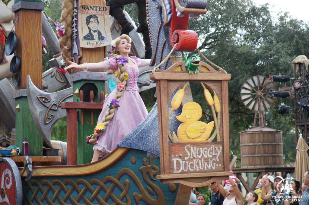 magic kingdom disney world florida parade with rapunzel on the tangled float