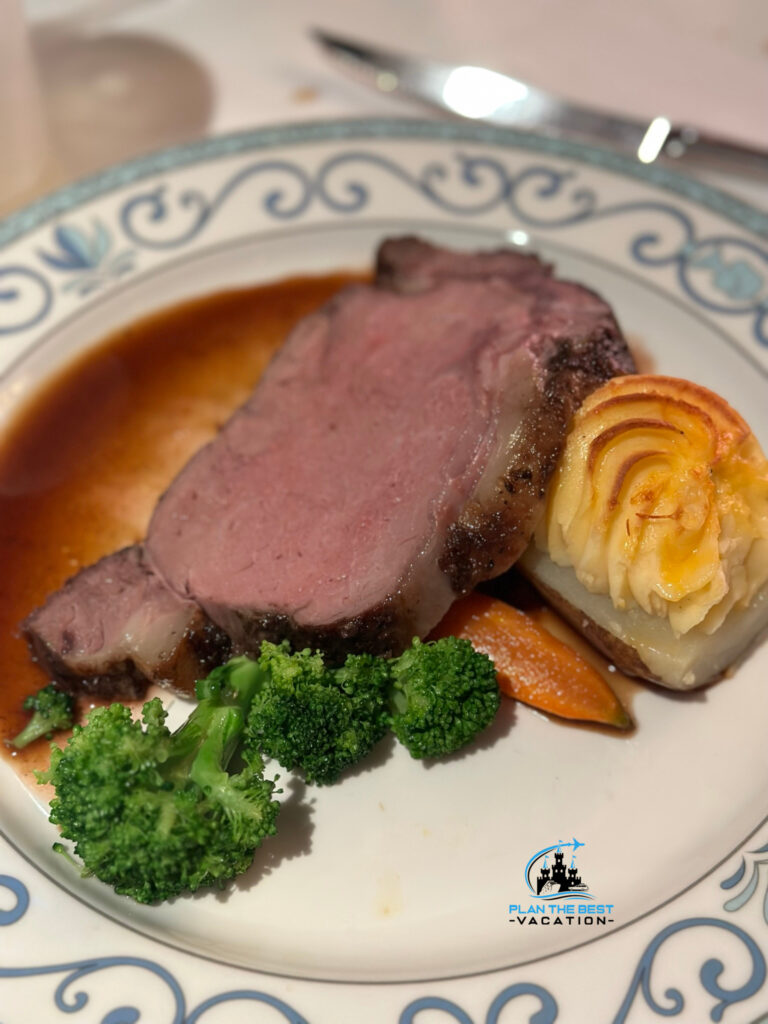 Garlic & Thyme Roasted Beef Rib-Eye with double baked potatoes buttered broccolini  sweet honey-roasted  carrots and cabernet jus