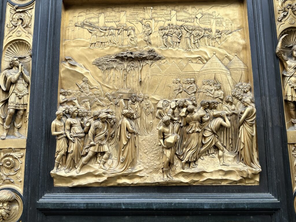 The Baptistery is renowned for its three sets of artistically important bronze doors with relief sculptures. The south doors were created by Andrea Pisano and the north and east doors by Lorenzo Ghiberti. Michelangelo dubbed the east doors the Gates of Paradise.