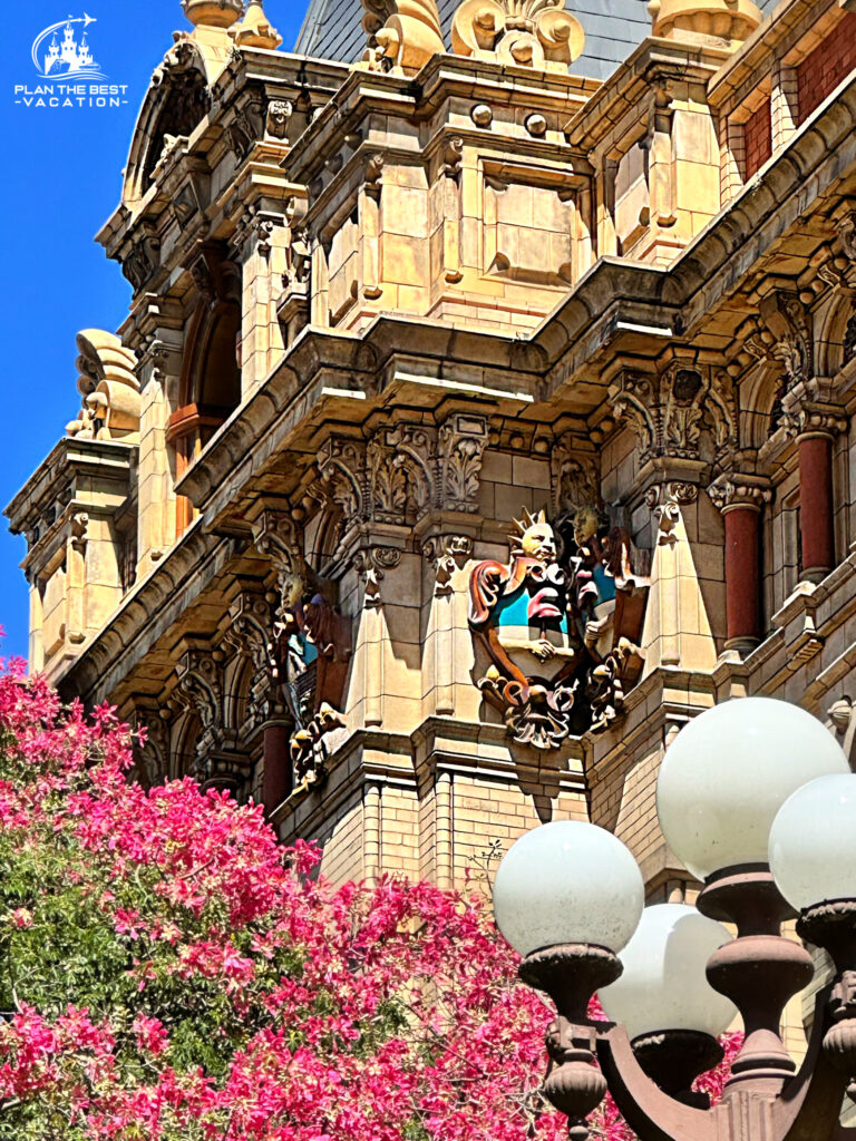 Palacio de Aguas Corrientes is a stunning building with blooming flowers in front
