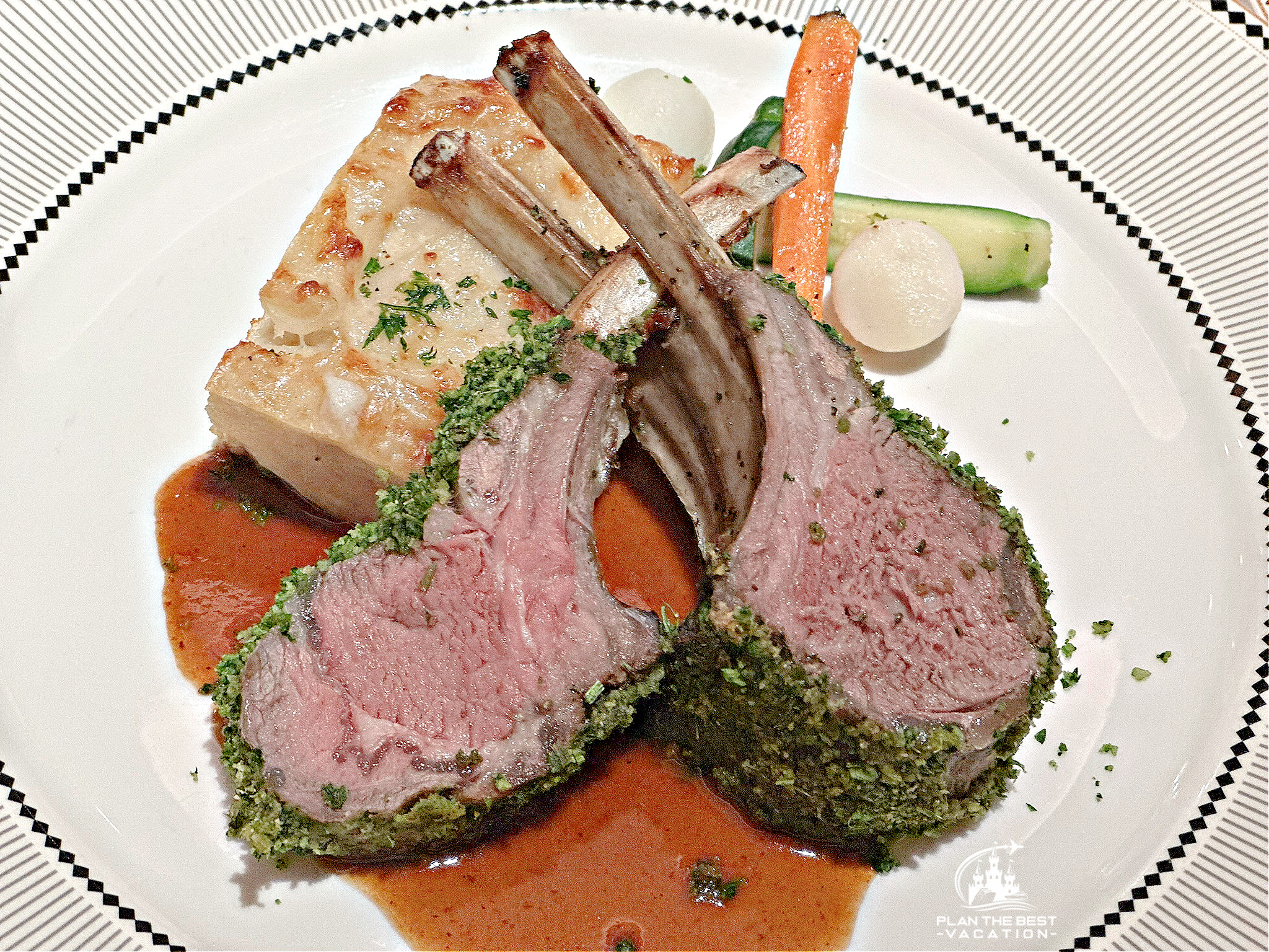 Rosemarry Crusted Rock of Lamb dauphinoise potato roasted petite turnip carrot and zucchini zinfandel rosemary sauce