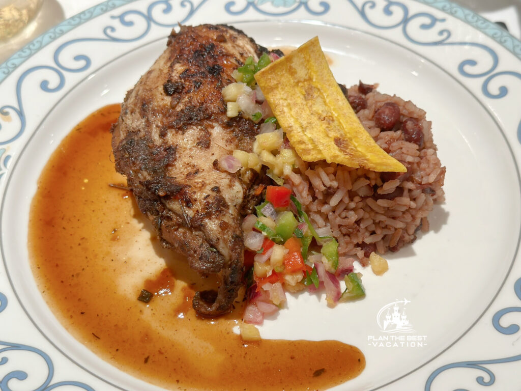 Tia Dalma's Jerk Chicken with 48-hour marinated chicken grilled and served with rice and peas topped with fried plantains and pineapple-Chili salsa