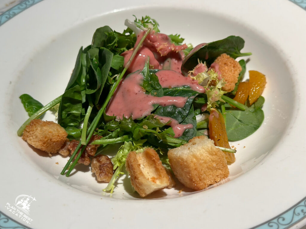 Troll Valley Baby Field Greens with vanilla, apricots, brioche croutons, candied walnuts, and lingonberry dressing