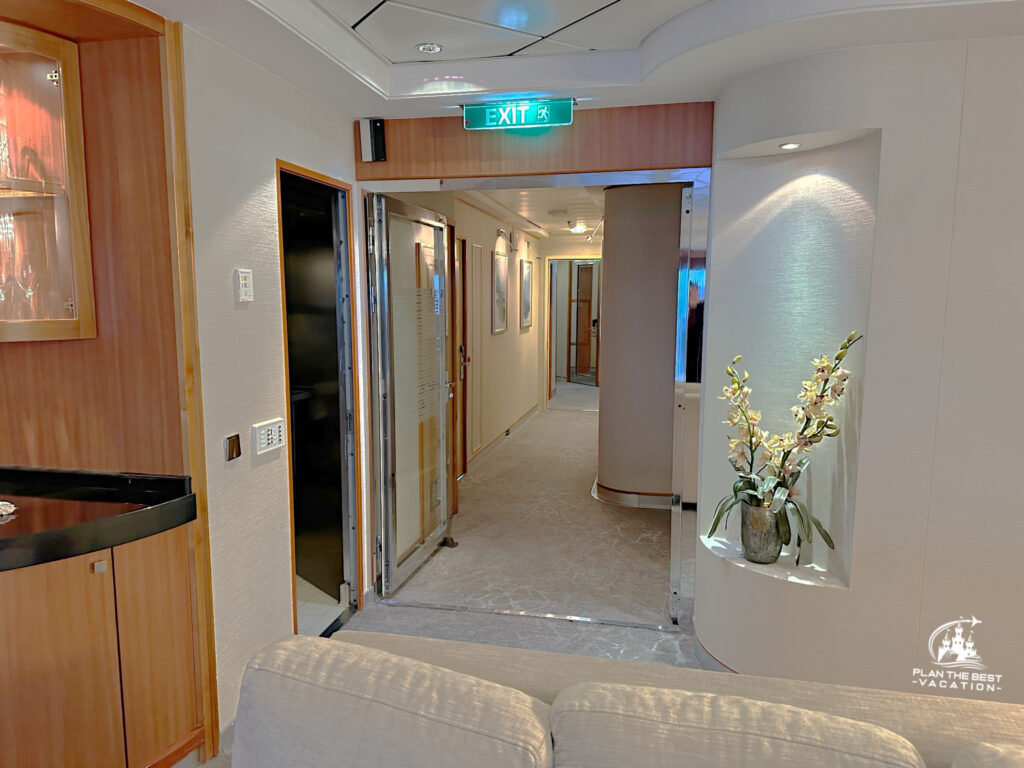 back of living room towards kitchen and hallway to rooms of norweigan star 3 bedroom garden villa suite