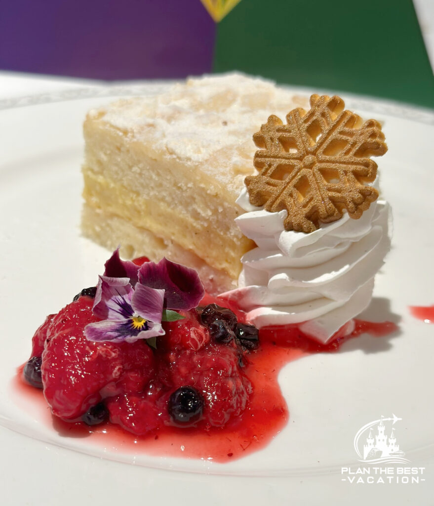 Kvaefjordkake - butter cake, baked almond meringue, vanilla cream, berry compote