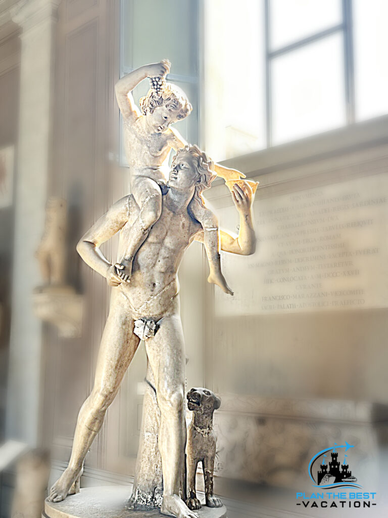 boy on shoulders statue at vatican city