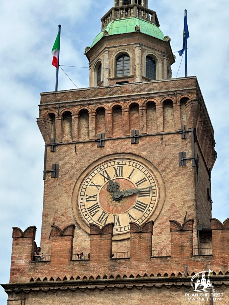 clock tower in major square in bologna italy