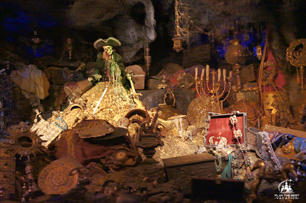 Pirate on pile of treasure and gold coins at Disneyland California Pirates of the Carribean Ride