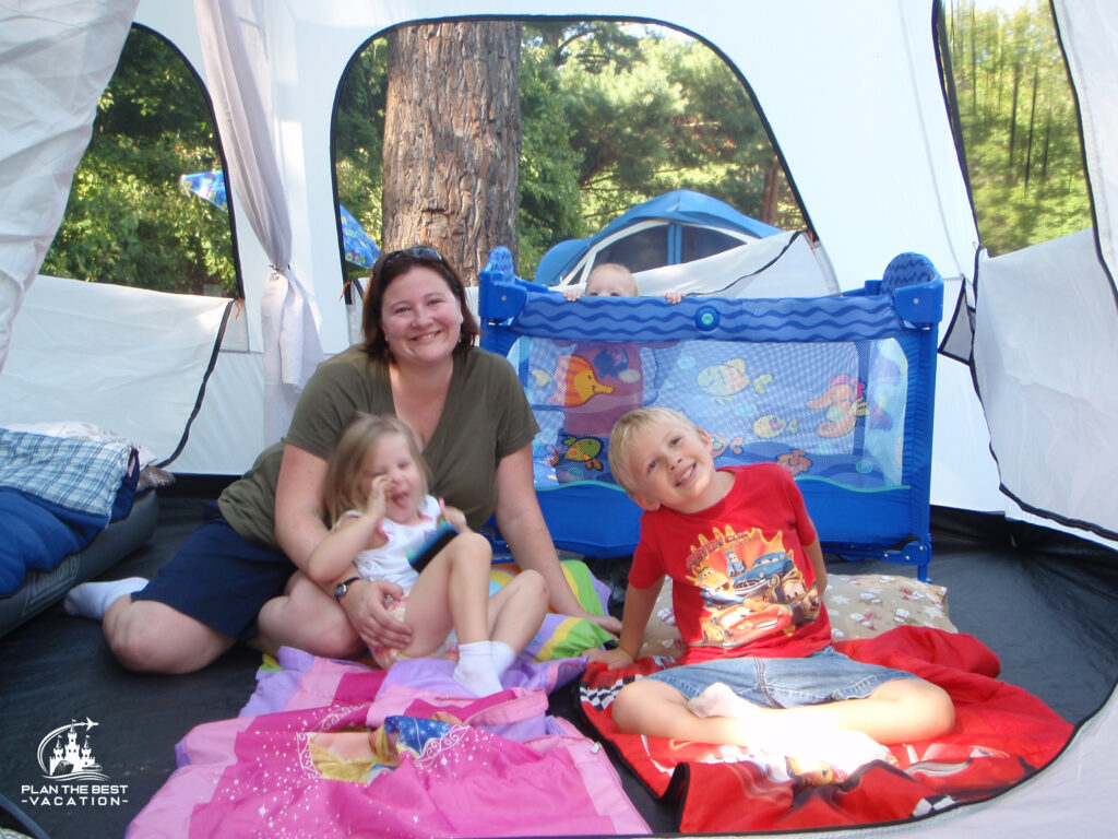 family tent camping with a baby in pack-in-play toddlers and preschoolers