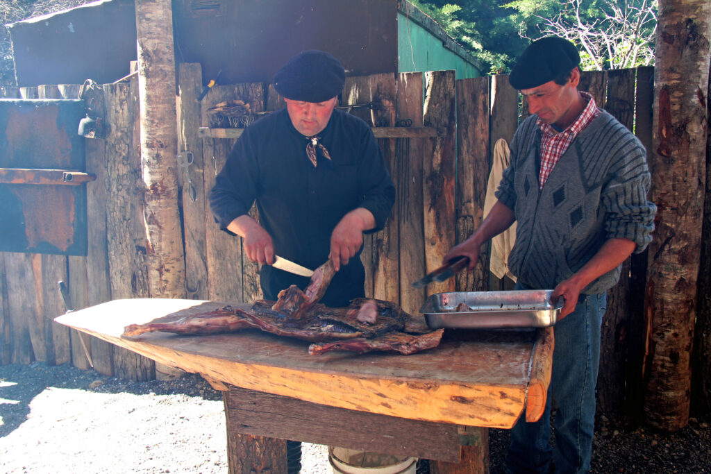 gaucho at ranch barbecued lamb outdoors at a ranch in Patagoni