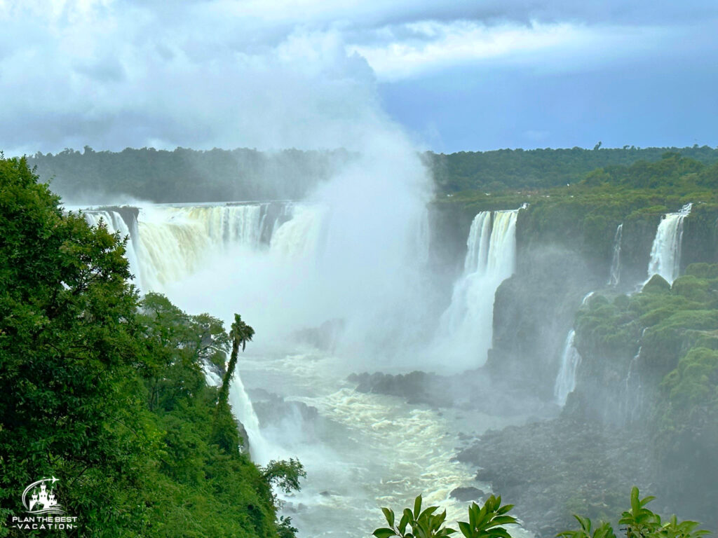 tons of water pressure and spray from the powerful iguazu falls view from the brazil side