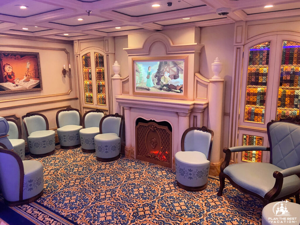 beauty and the beast library in the Disney kids club where kids can sit and watch a movie in a quiet nook