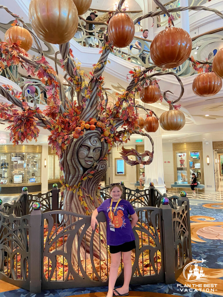 halloween on the high seas pumpkin tree in atrium of disney wish cruise ship