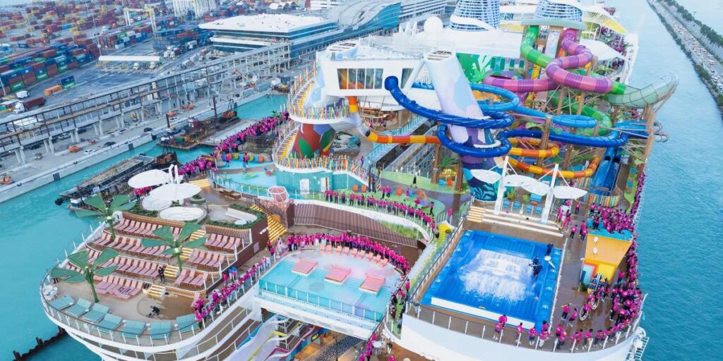 Learn about the largest cruise ship in the world - Royal Caribbean Icon of the Seas in our thorough review: food, entertainment, staterooms, and tips for a fantastic family vacation!