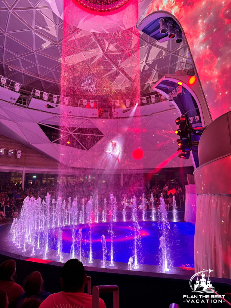 beautiful aerial acrobatic dancing in aqua magic show on icon of the seas aquadome