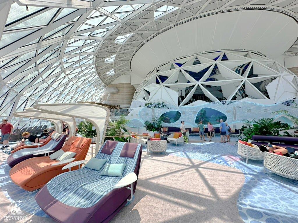 best place to relax on the icon of the seas is behind the aqua dome