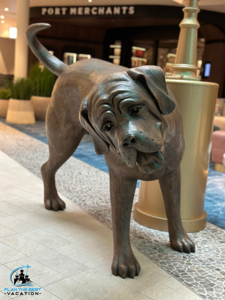 icon of the seas statues peeing dog in atrium