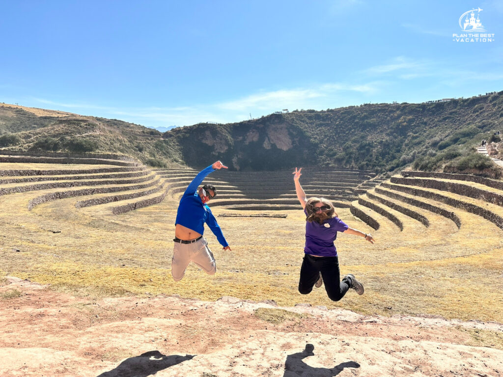 jumping picture at moray ruins in cusco peru of adventure guides