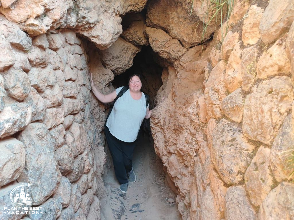 pitch black tunnel through ruins at The Stones of Sacsayhuaman