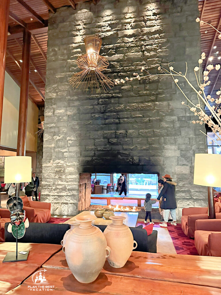 tambo del inka hotel lobby with huge fireplace