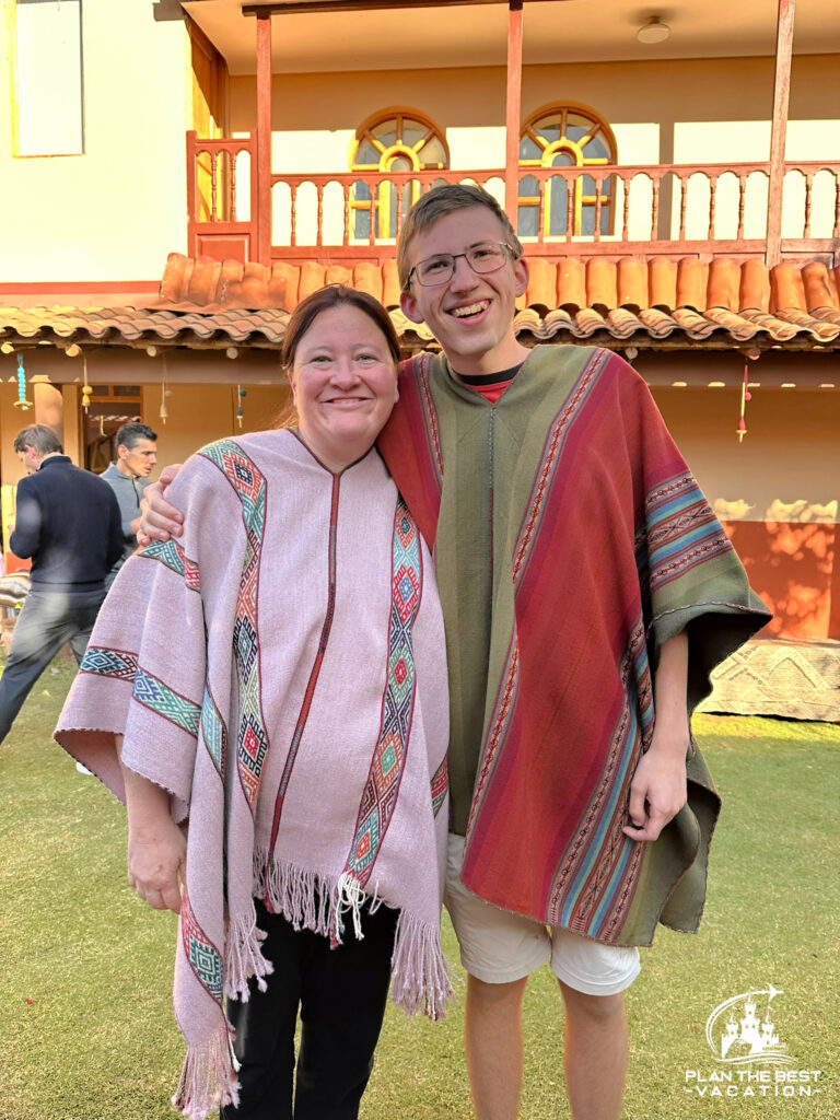 travelers in ponchos in cusco peru