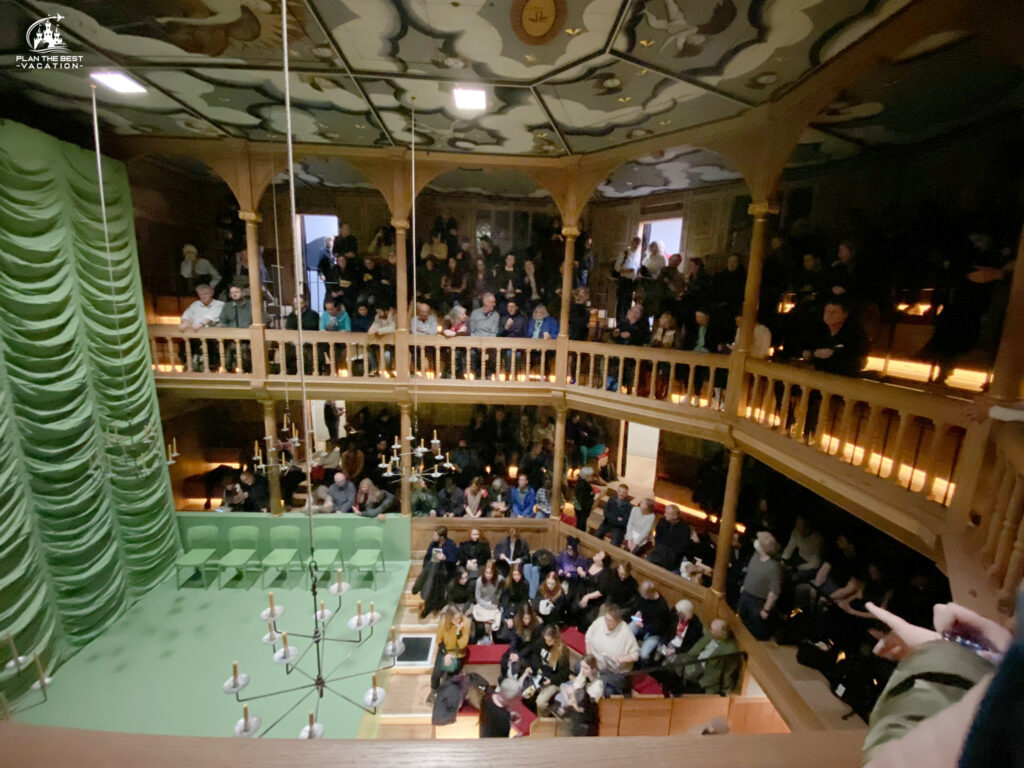Shapeare's Globe THeatre watching Henry V in the sam wanamaker theatre