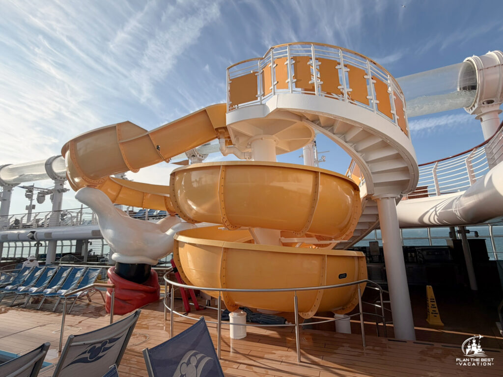 Mickey’s Slide. It is a fun, kid-friendly open slide located right at Mickey's Pool on the upper deck, intended strictly for children between the ages of 4 and 14 who measure from 38 to 64 inches tall