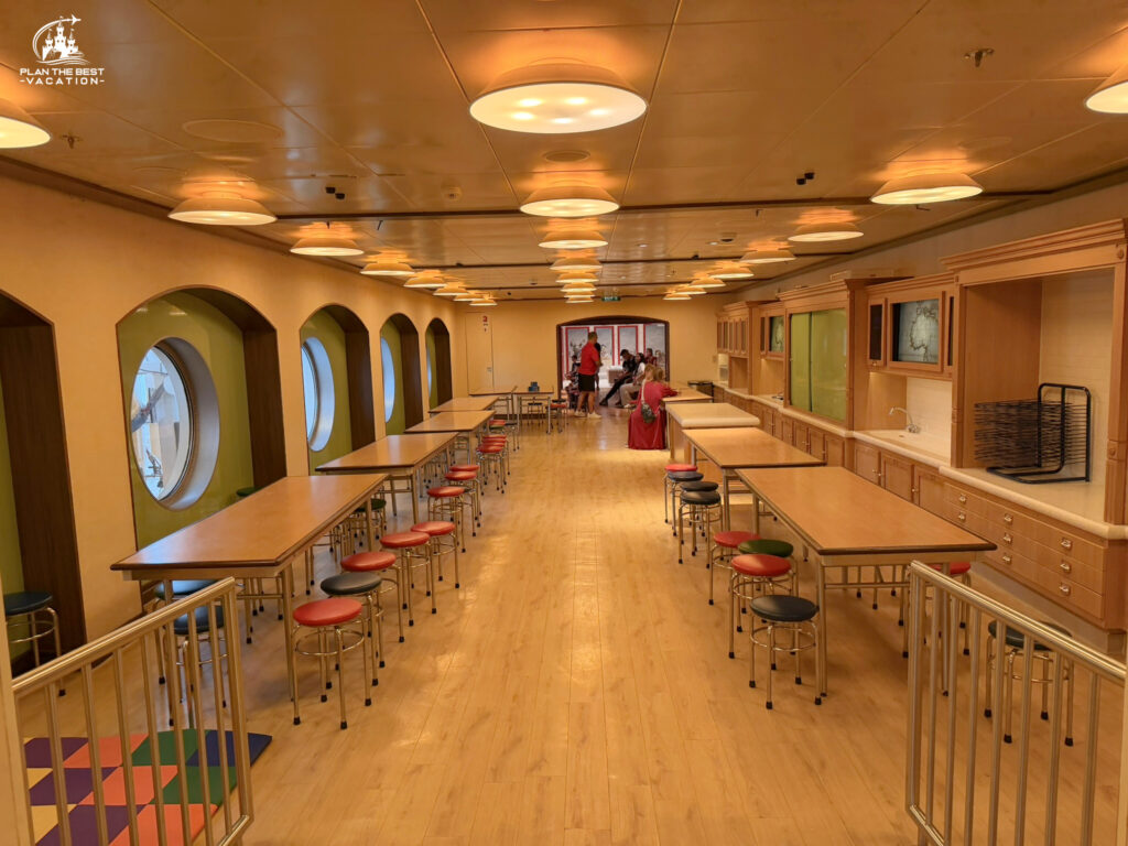 On the Disney Dream the connecting corridor between the Oceaneer Club and the Oceaneer Lab on Deck 5 features a secure themed transition hallway