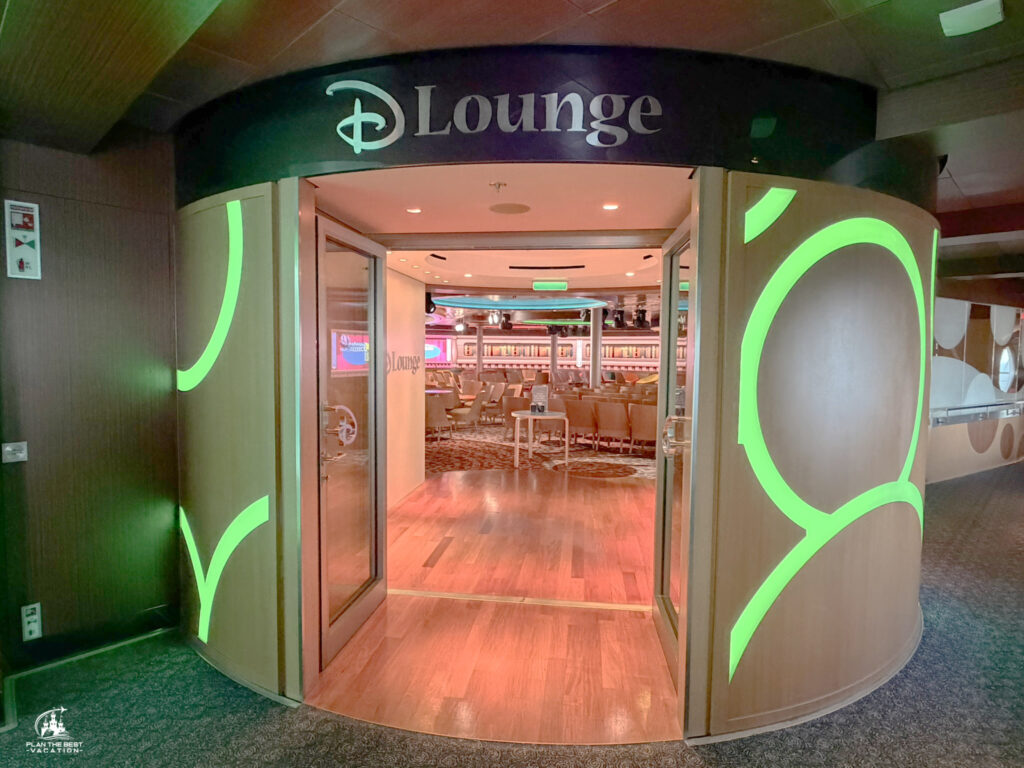 The D Lounge on the Disney Dream is a vibrant, family-friendly entertainment hub located on Deck 4, Midship. It serves as a central gathering space where parents and kids can enjoy interactive group activities, games, and live entertainment