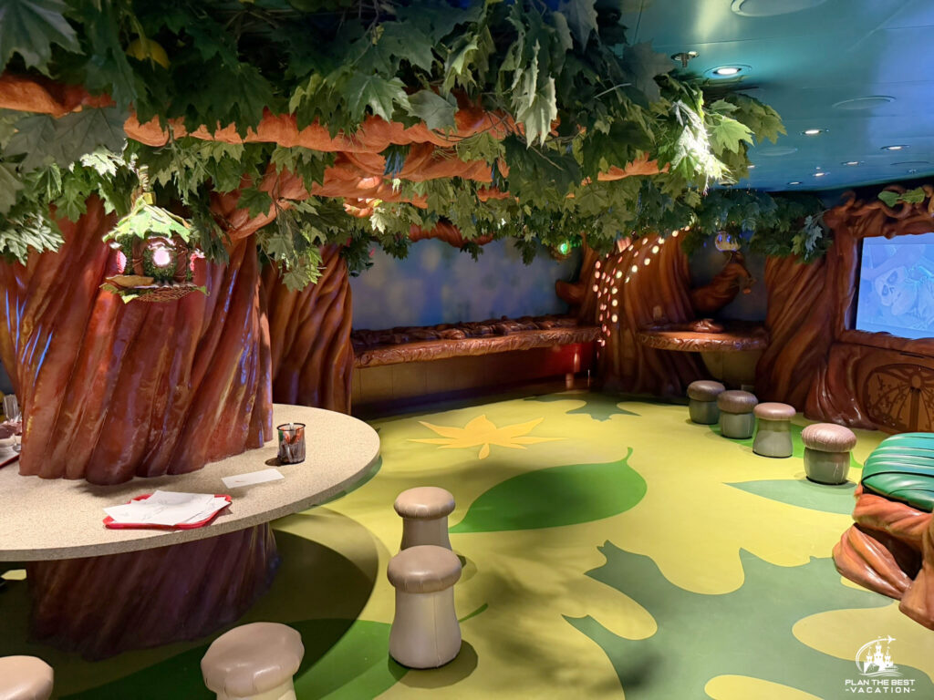 Tinker Bell-themed area is called Pixie Hollow. It is a magical, fairy-inspired room located inside the Disney's Oceaneer Club on Deck 5, designed specifically for children ages 3 to 12