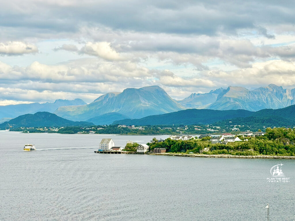 As with all ports on your Norweigan Fjords cruise, I highly recommend you watch the boat arrive and depart the port to get breathtaking views of the fjord, charming villages, mountains, wildlife, and more! Depending on the time of year you may see whales, the Northern Lights, and breathtaking sunsets! alesund norway view from disney ship
