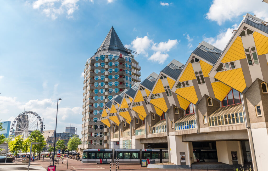 Yellow cubic houses and pencil house in the center of Rotterdam Yellow cubic houses and pencil house in the center of Rotterdam